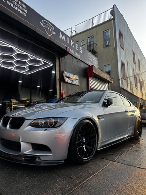 BMW M3 detailed outside Mike's Detailing Brooklyn shop
